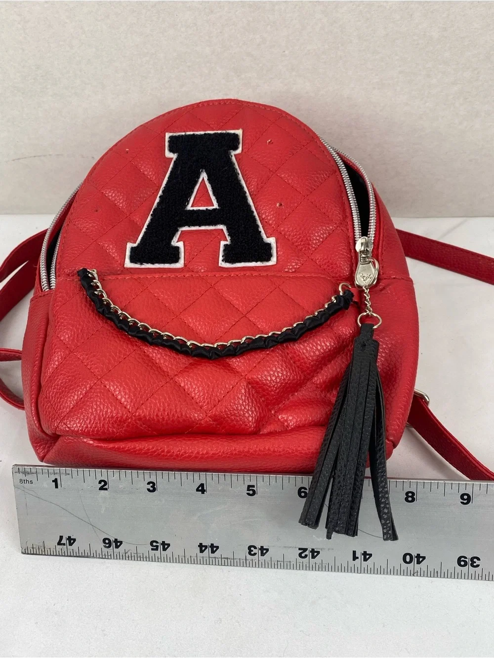 Justice Red Quilted Mini Backpack with Black Patch